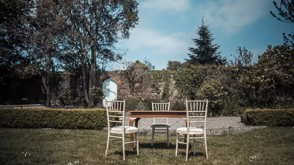 An outdoor civil ceremony at Horetown House, guests seated on the lawn