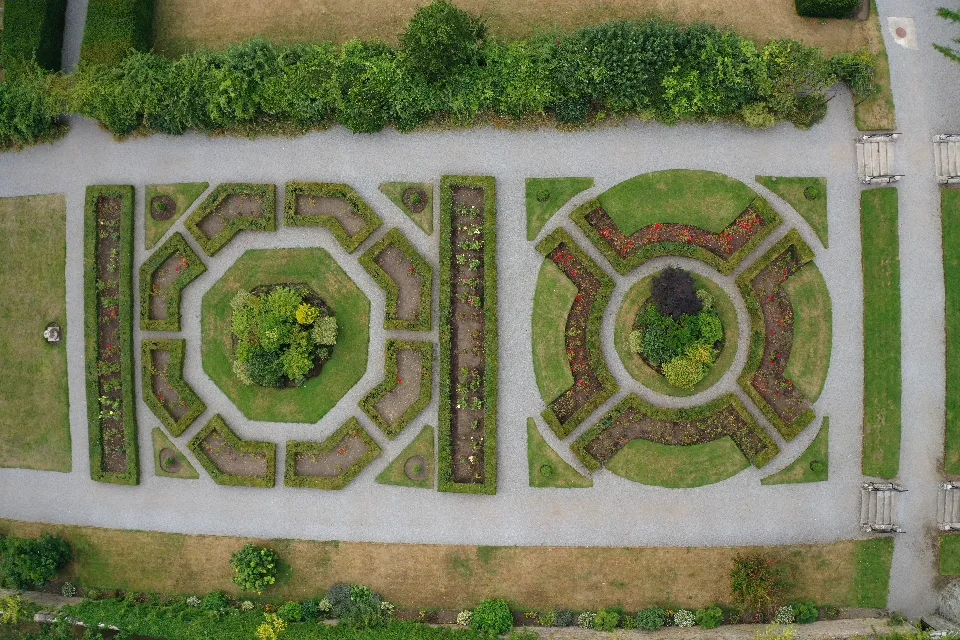Looking straight down on the formal parterre garden at Kilkea Castle, symmetrical beds and gravel paths