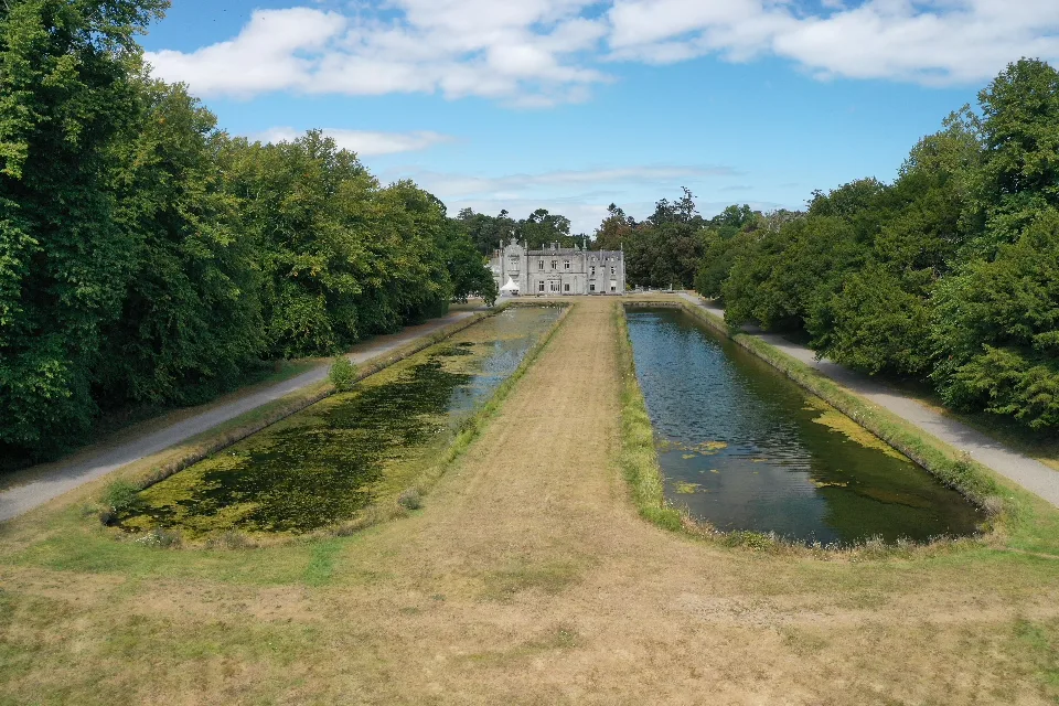 The Long Ponds at Killruddery seen from the air, twin canals running away from the house between trees
